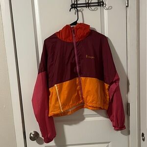 Cotopaxi women’s windbreaker - Red, Orange, Pink